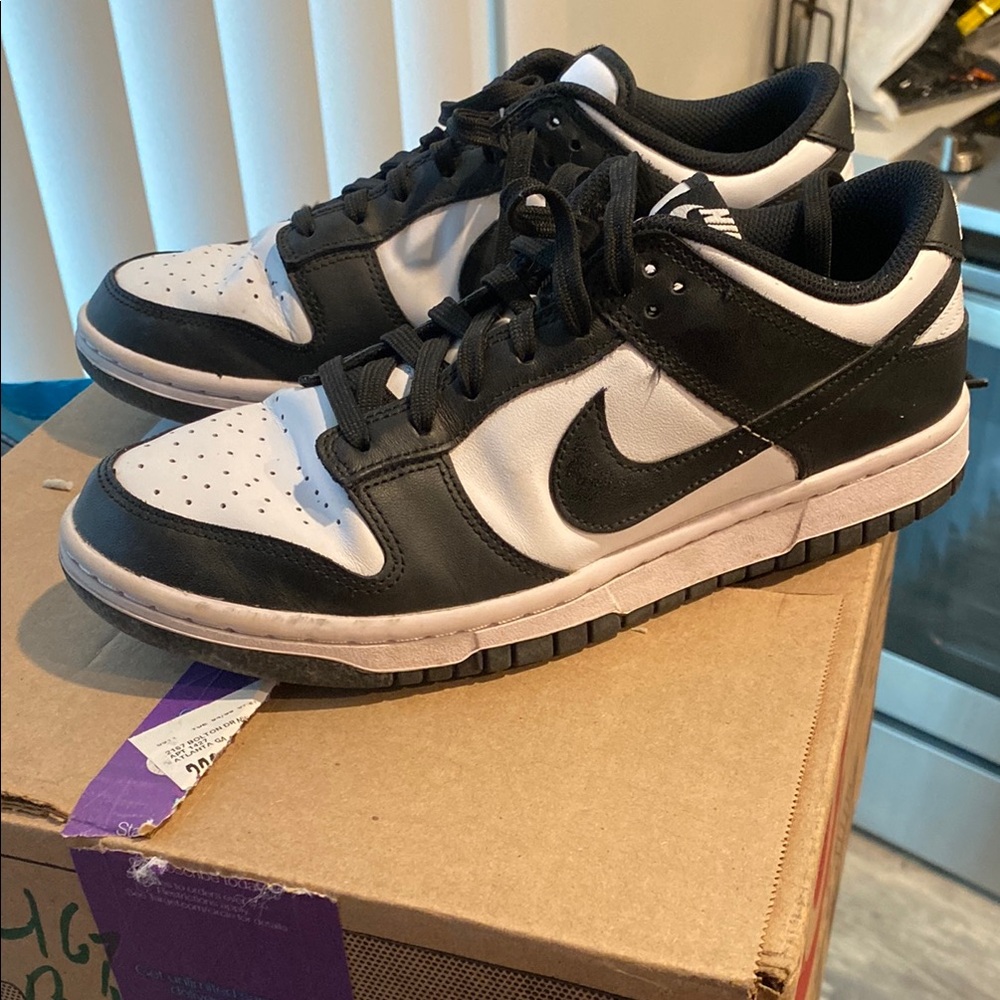 Nike women’s low dunks Black and White Sneakers